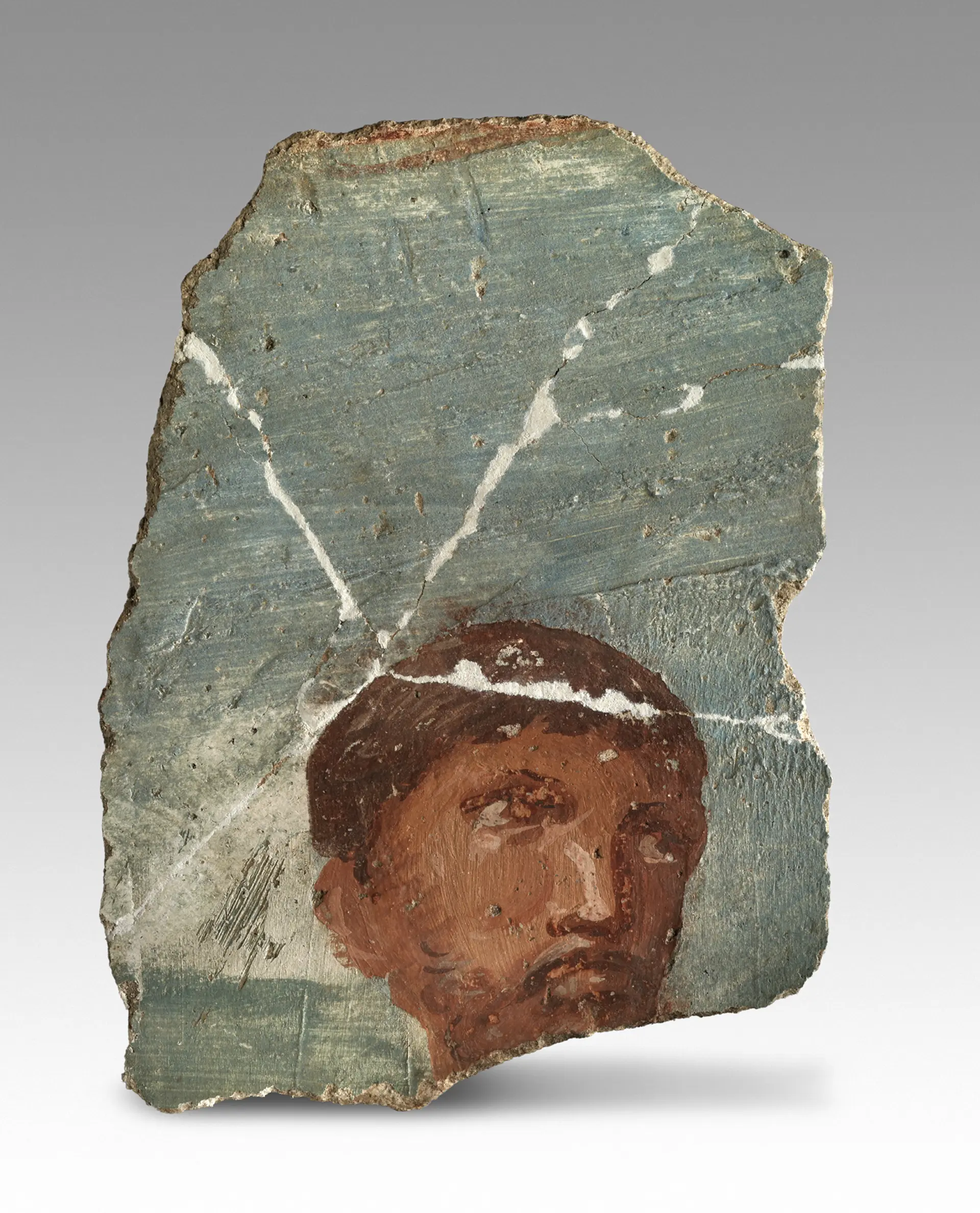 Fragment eines Wandgemäldes aus der CUT mit dem Kopf des "Pferdeführers"