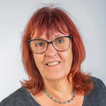 Portrait einer Mitarbeiterin.