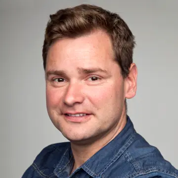 Portrait eines Mitarbeiters.