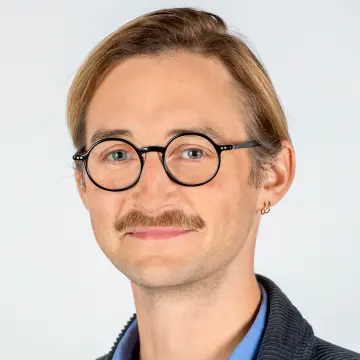 Porträt eines Mitarbeiters.