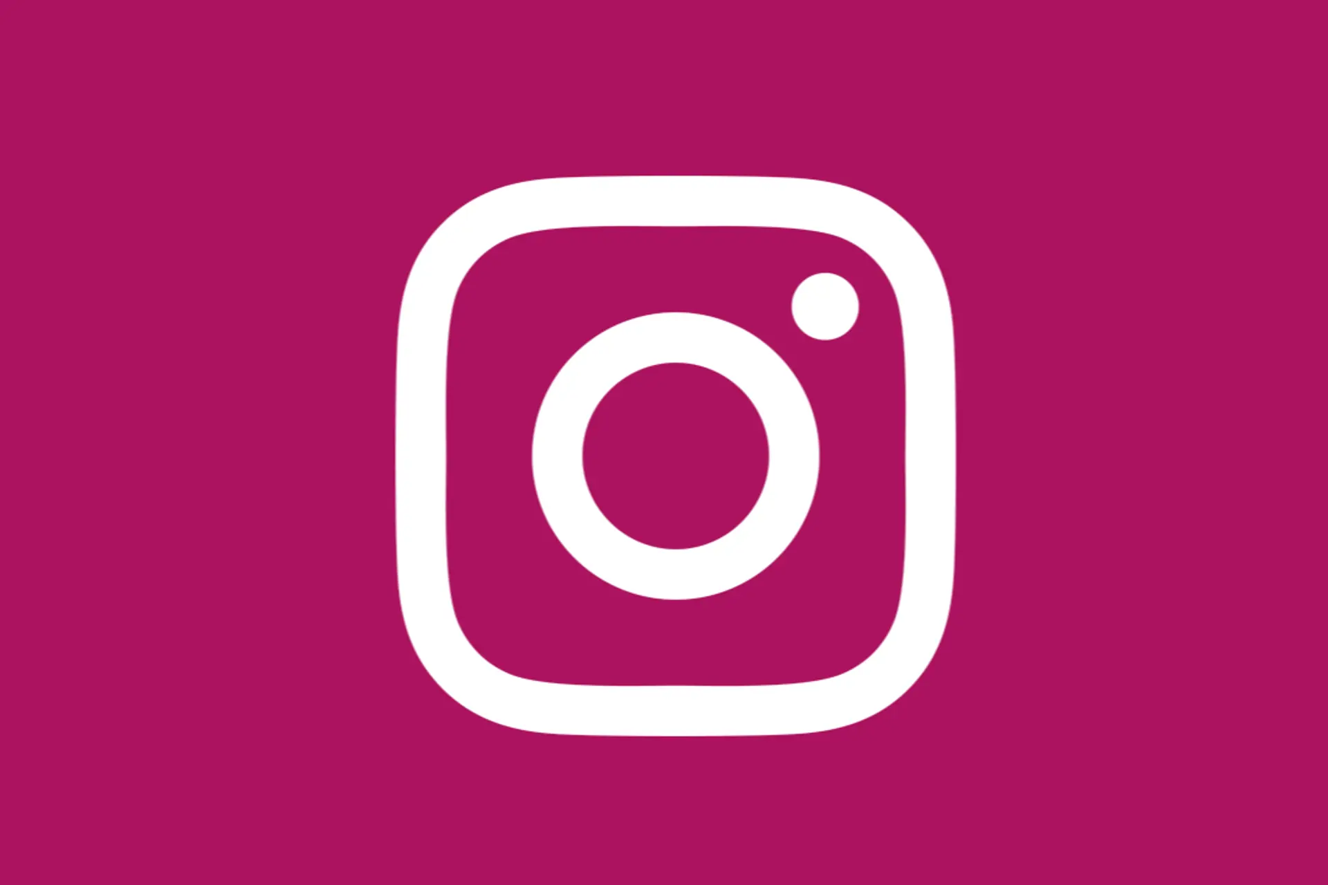 Das Logo von Instagram in Weiß auf einer einfarbigen Fläche