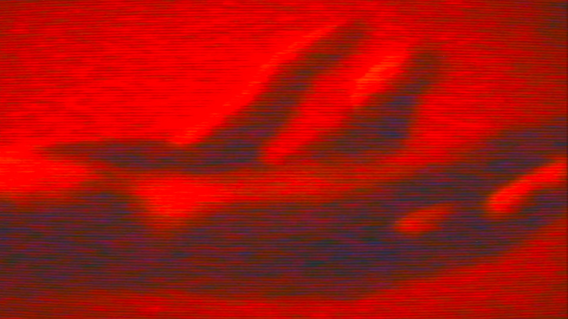 Zwei Hände auf rot-schwarzer Fläche