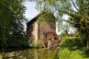 Foto: Wassermühle im Sonnenschein.