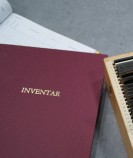 Foto: Buchtitel mit der Aufschrift "Inventar"