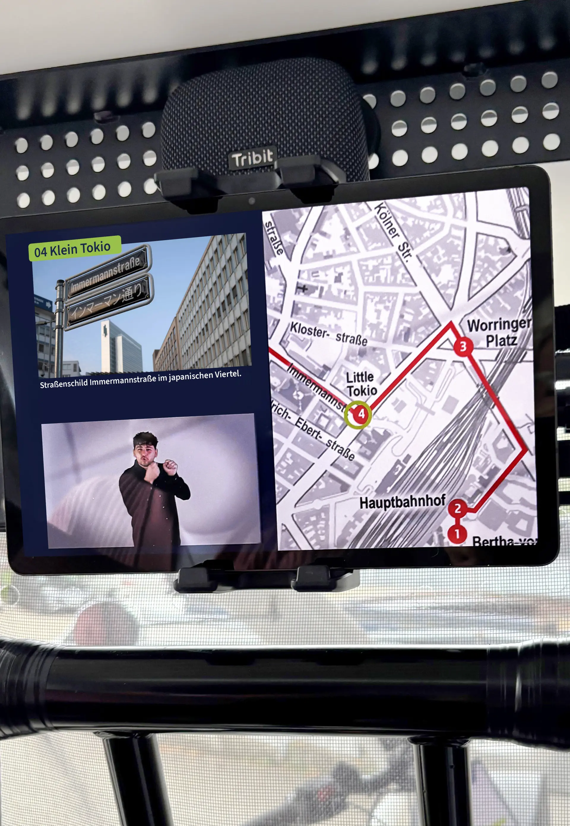 Tablet mit Navigationsansicht einer inklusiven Stadtführung durch das Düsseldorfer Viertel „Little Tokio“